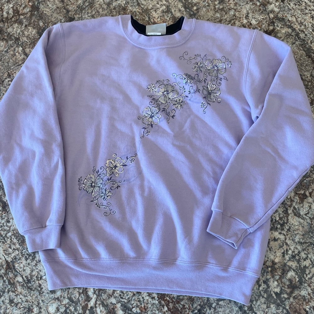 Day Breeze purple sweater with holographic decal.